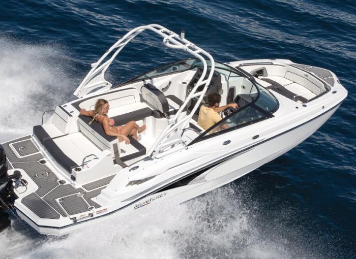 A couple enjoying a Monterey bowrider boat powered by a mercury outboard motor