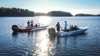 Two J-Craft boats out on a lake